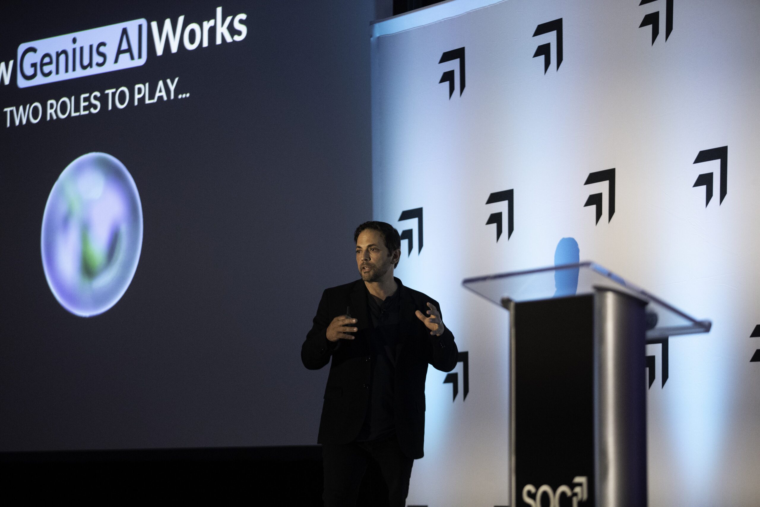 Afif speaking on stage at SOCi ReImagine 