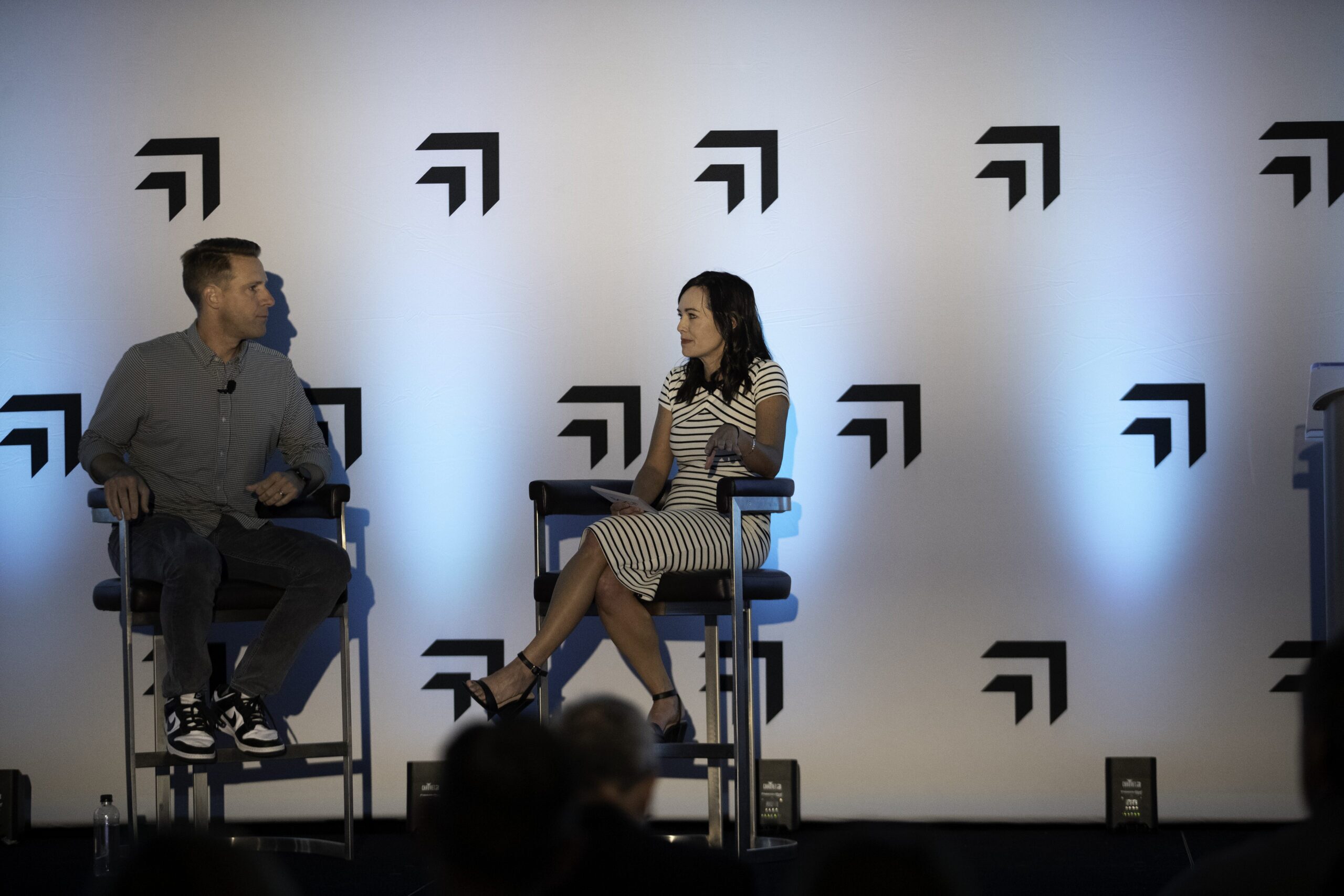 SOCi CMO Monica Ho taking the stage a SOCi ReImagine