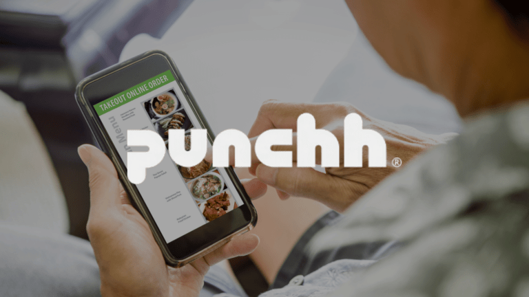 A person ordering food online on a smartphone with an overlay of the Punchh logo.