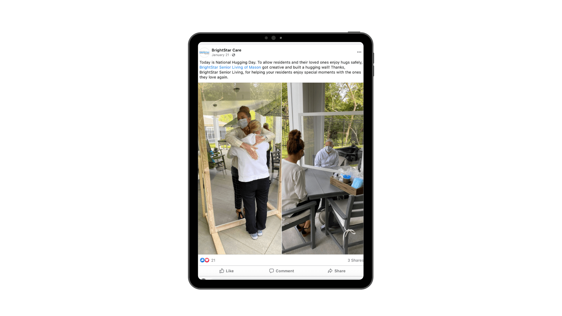 A tablet displaying a social media post with a caregiver hugging an elderly person near a table.